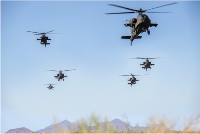 A flyover of AH-64 Apaches takes place at the Boeing Mesa site in Arizona.